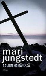Kansi: Mari Jungstedt: Aamun hämärissä