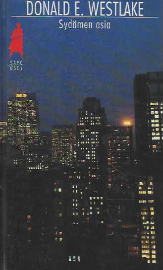 Sydämen asia -kirjan kannessa on öinen näkymä pilvenpiirtäjiin.