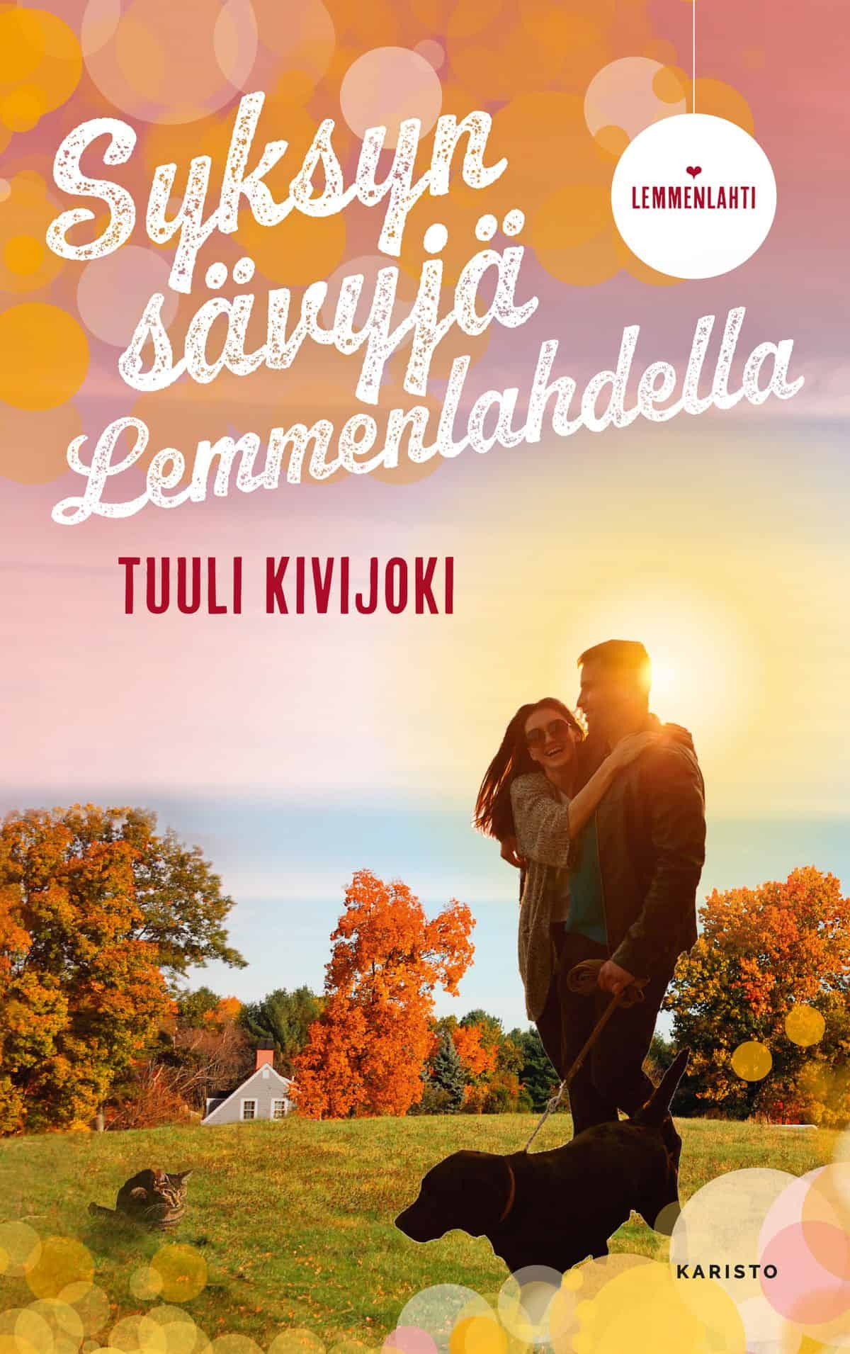Syksyn sävyjä Lemmenlahdella -kirjan kannessa on mies ja nainen syleilemässä, vieressään koira. Aurinko paistaa järveltä parin takaa ja taustalla näkyy syksyisiä puita.