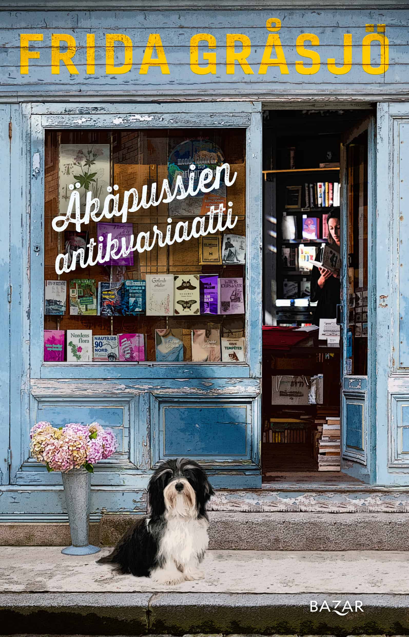 Äkäpussien antikvariaatti -kirjan kannessa on pienen antikvariaatin ovi ja näyteikkuna. Kadulla liikkeen edessä pötköttelee koira.
