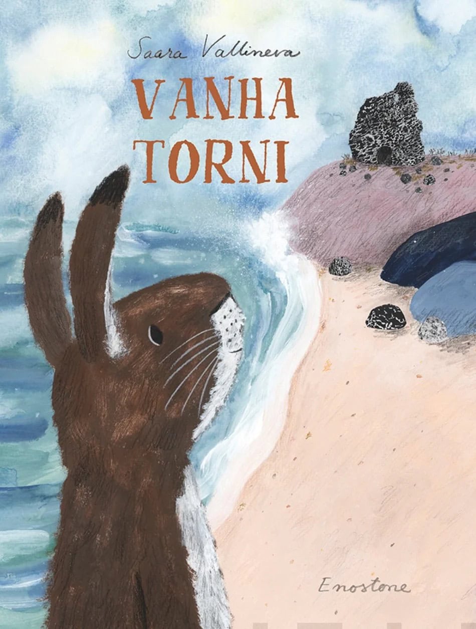 Vanha torni -kirjan maalatussa kannessa ruskea jänis katselee hiekkarannalla kallion päällä kohoavaa vanhaa raunioitunutta kivitornia.