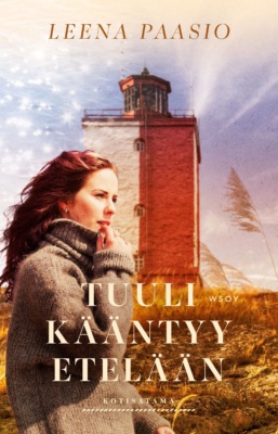 Tuuli kääntyy etelään -kirjan kannessa on ruskeaan villapaitaan pukeutunut punatukkainen nainen, joka seisoo Utön majakan edustalla.