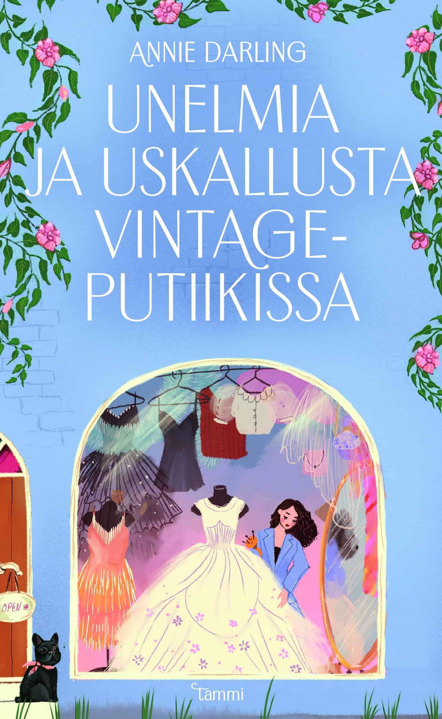 Unelmia ja uskallusta vintageputiikissa -kirjan kannessa on piirros naisesta somistamassa vintagemekkokaupan näyteikkunaa, jossa on iso valkoinen mekko.