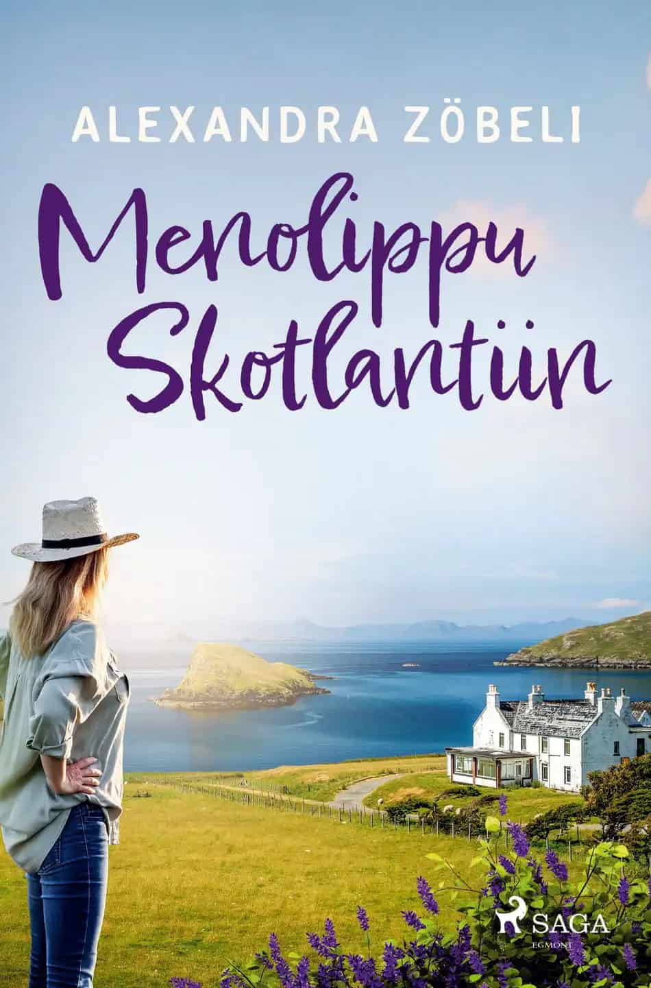 Hattuun, paitaan ja farkkuihin pukeutunut nainen katselee ylämaalaismaisemaa nummella. Taustalla näkyy valkoinen talo, rantaa ja saari.