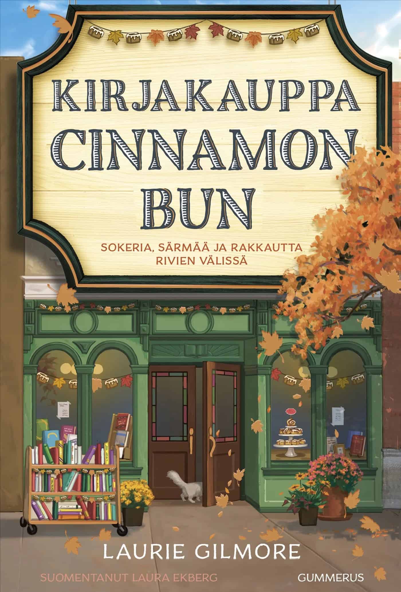 Kirjakauppa Cinnamon Bun -kirjan kannessa on piirros sympaattisen pikkukirjakaupan julkisivusta.