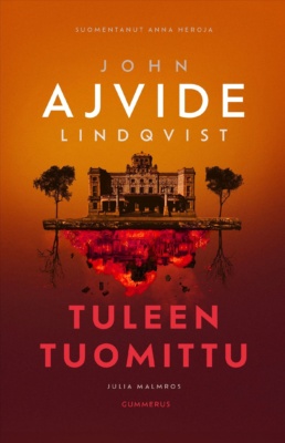 Tuleen tuomittu -kirjan oranssissa kannessa on hieno rakennus, joka heijastuu alapuolelleen liekehtivänä.