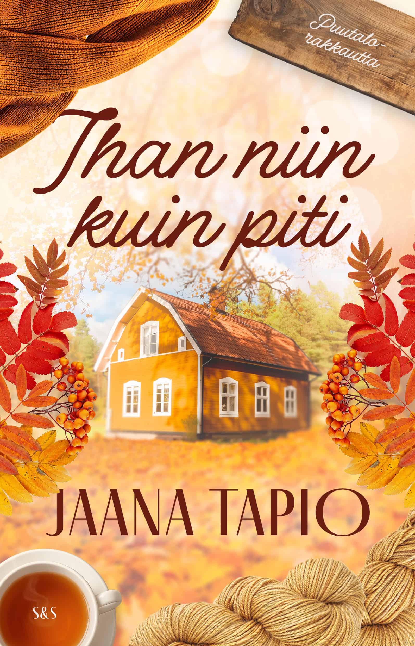 Ihan niin kuin piti -kirjan kannessa on syksyinen keltainen puutalo, jonka ympärillä on teekuppi, lankoja ja punaisia pihlajanlehtiä ja -marjoja.