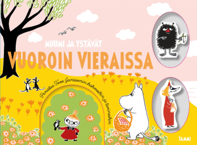 Vuoroin vieraissa -kirjan kannessa on Muumi kukkakedolla. Kannessa on kaksi reikää, joissa on Haisuli- ja Vilijonkka-hahmot.